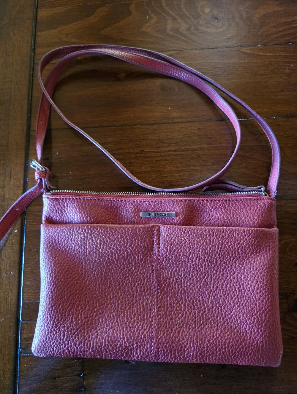 Roots  Red Pebbled  Leather Cross Body Bag